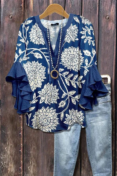 Florina™ - Blus med Blommönster, Volangärmar och Feminint Snitt